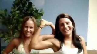 Girls flexing lift carry wrestling